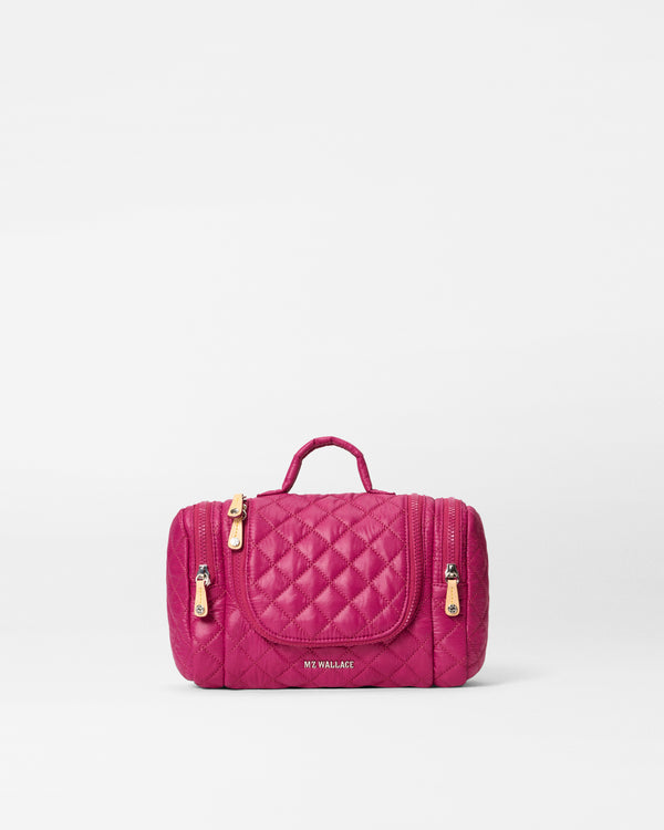 Front view of MZ Wallace Pink Travel Toiletry Bag