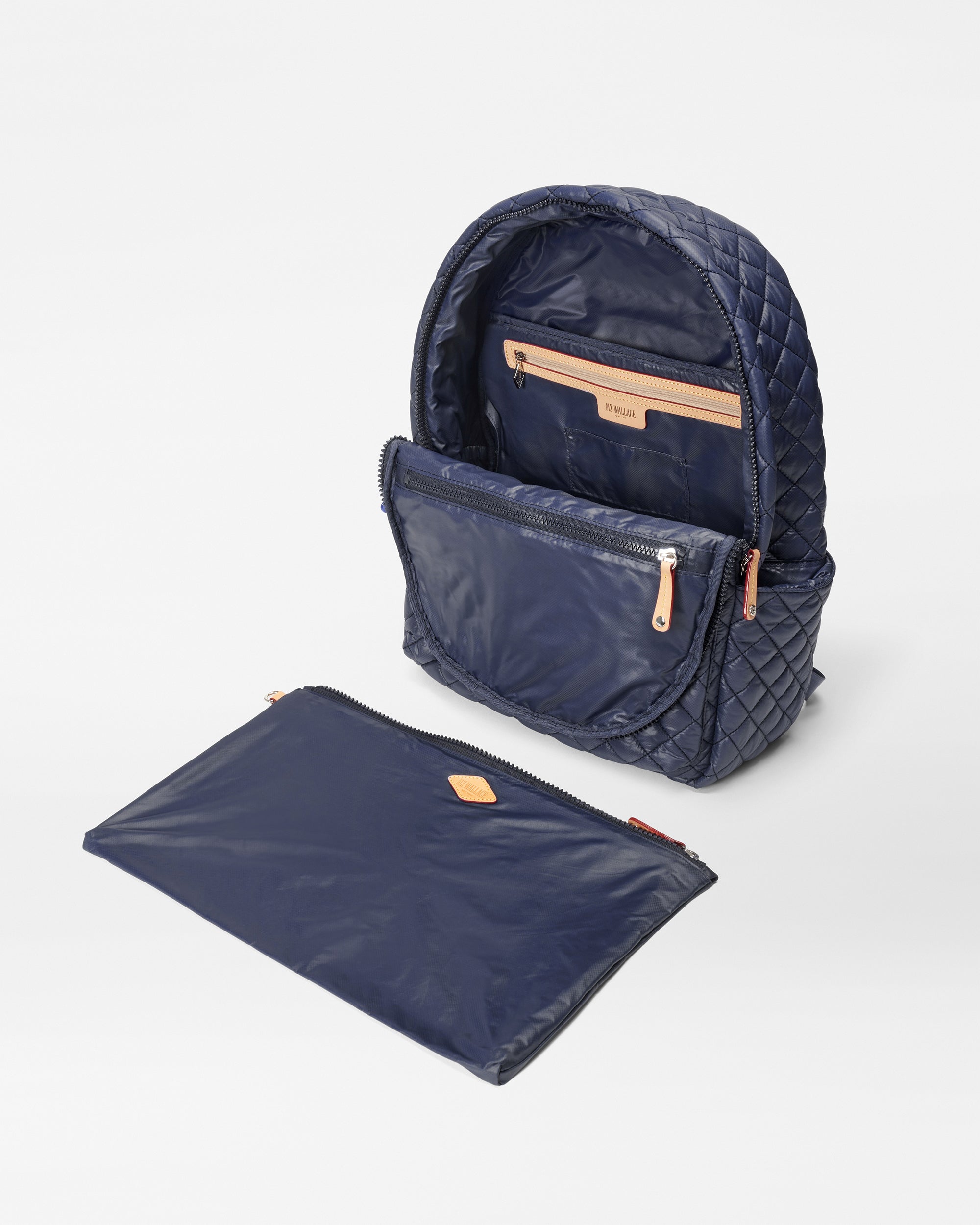 Open Dawn Metro Backpack II - Quilted Navy Blue Backpack with other accessories