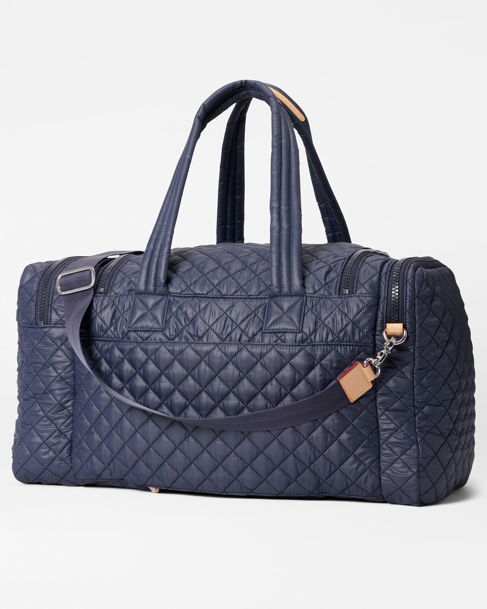 Back view of MZ Wallace Navy Blue Overnight Bag with detachable strap