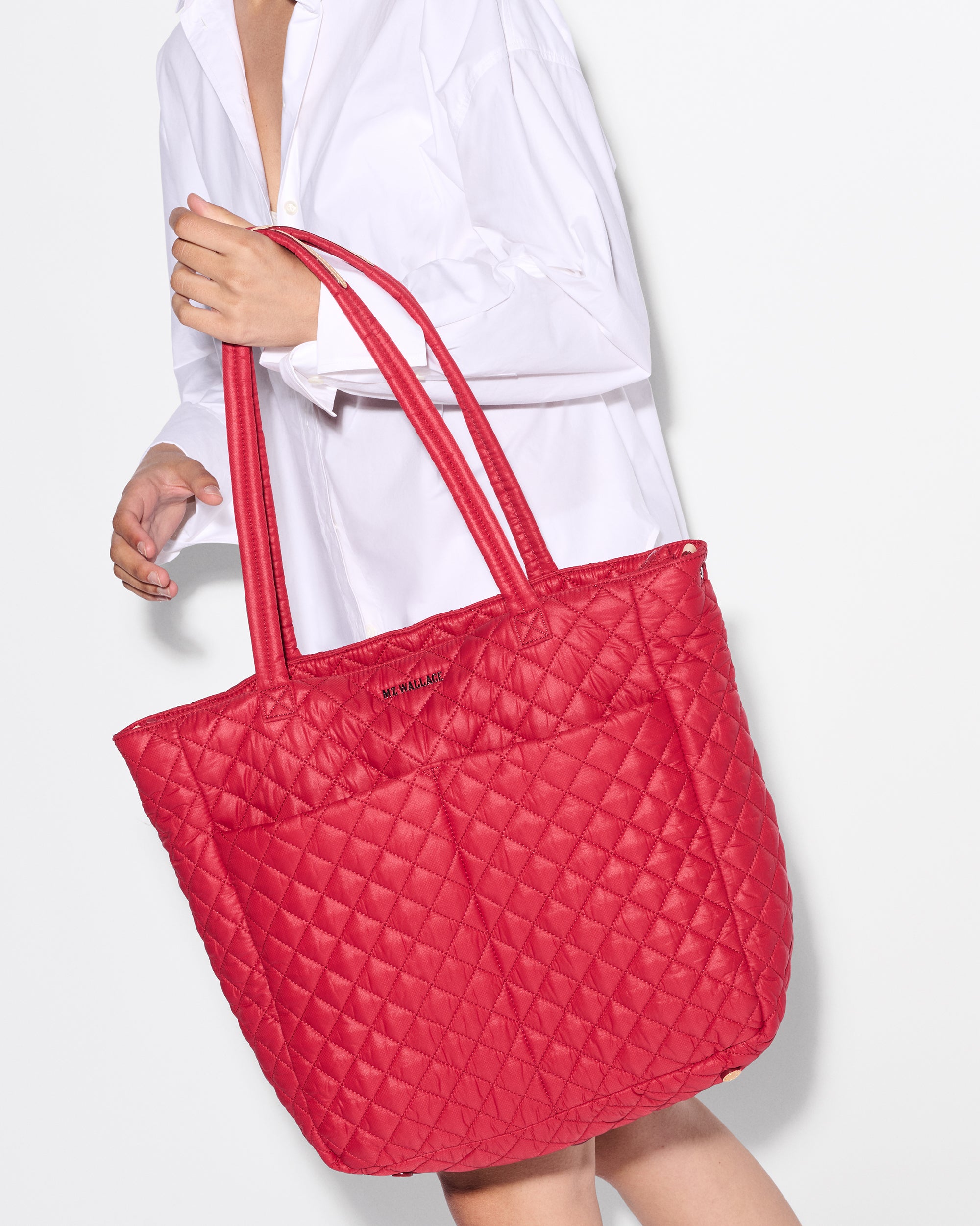 Model Holding Large Red Shoulder Tote Bag