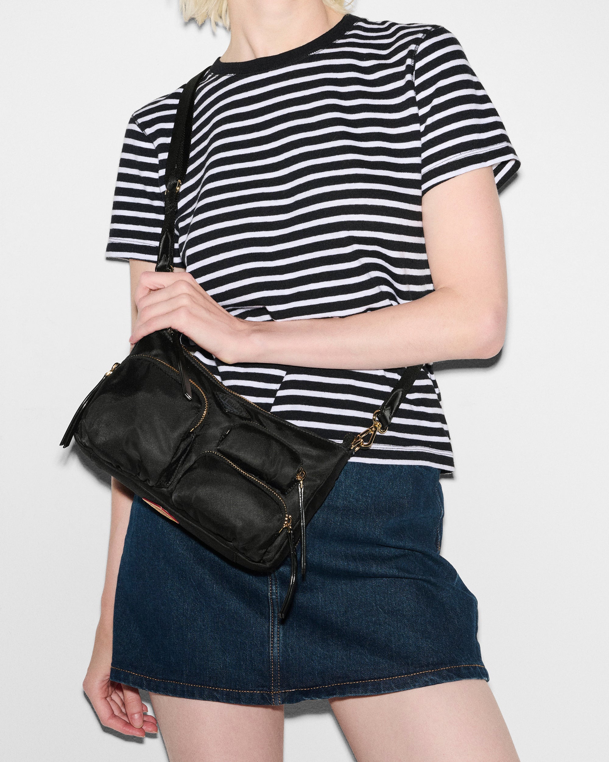 Woman wearing MZ Wallace Small Black Shoulder Bag as crossbody