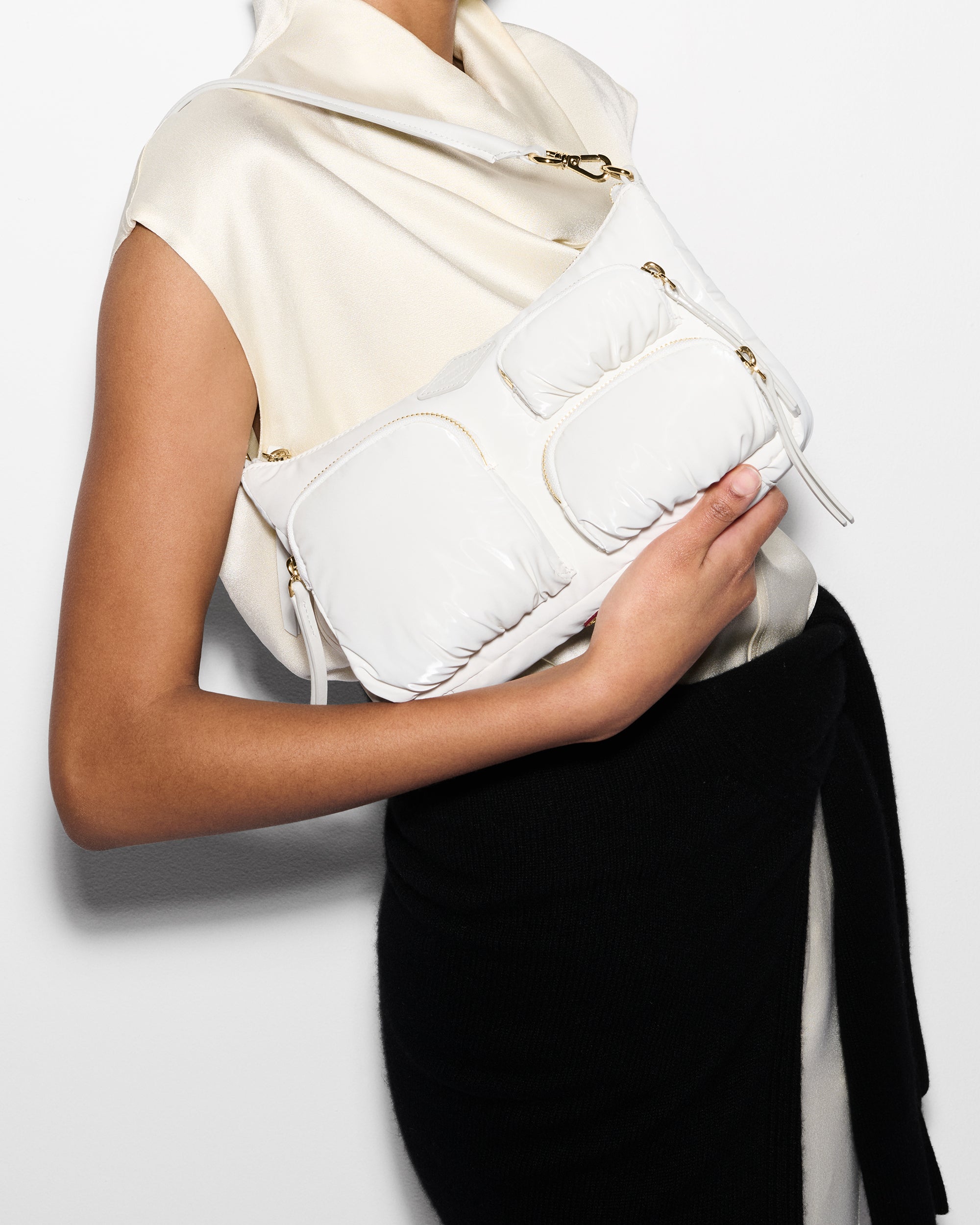 Woman wearing MZ Wallace Small White Shoulder Bag