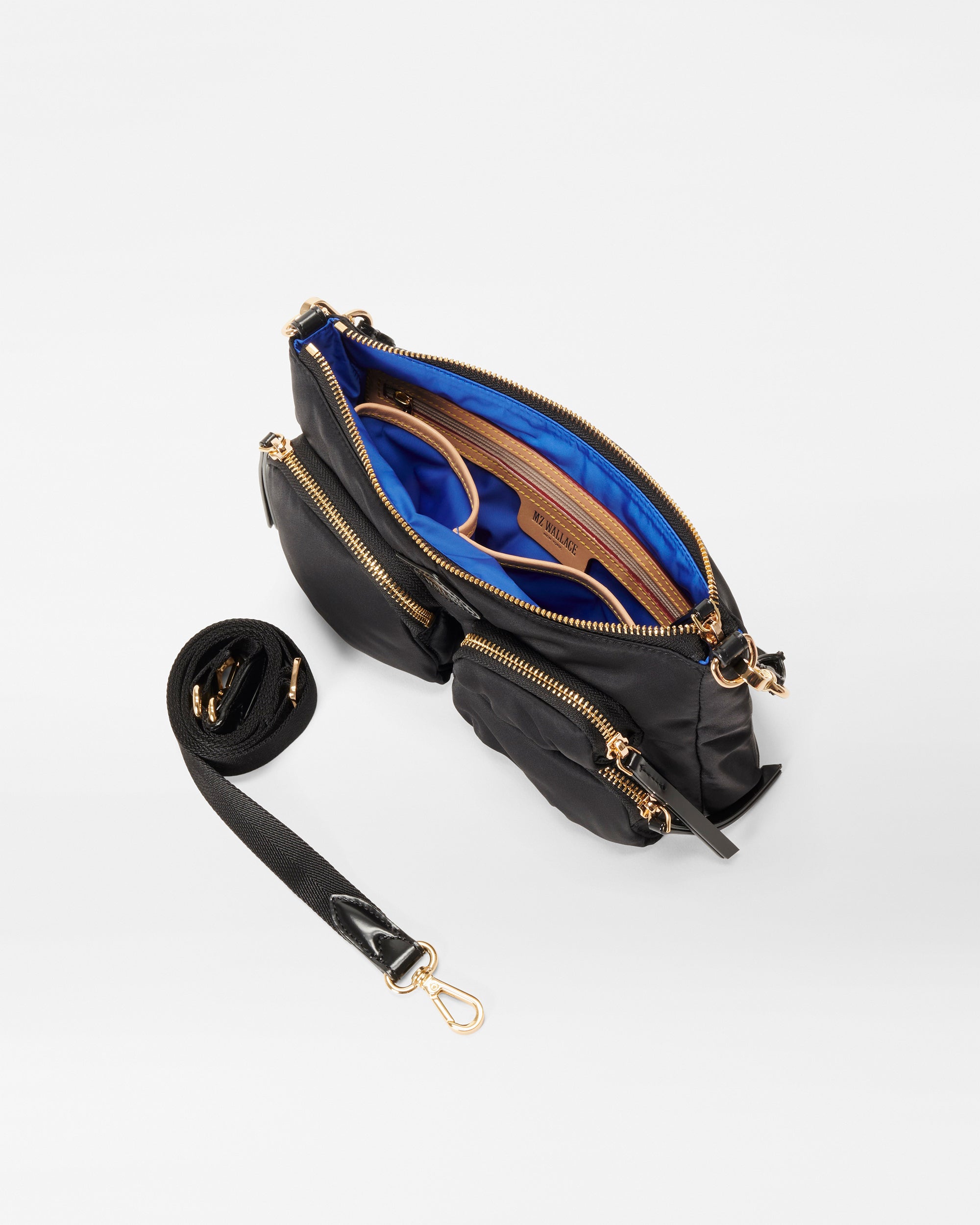 Interior view of MZ Wallace Small Black Shoulder Bag with strap