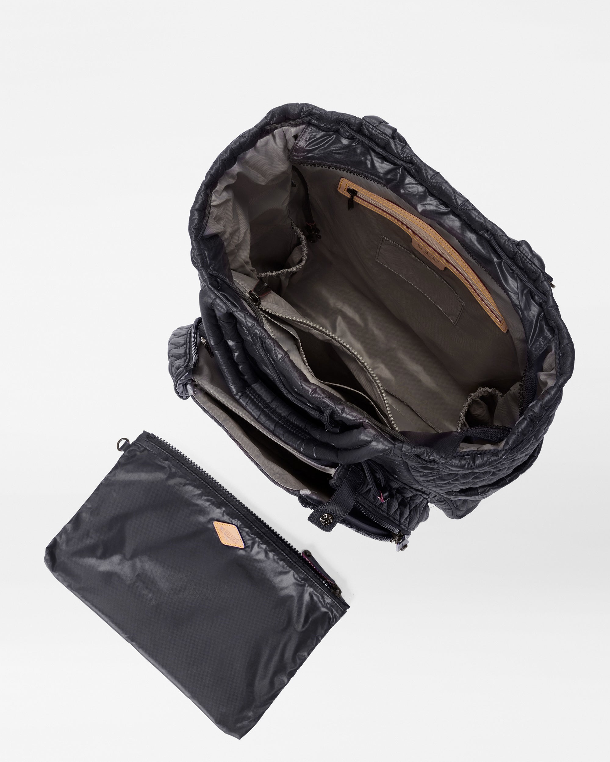 MZ Wallace Convertible Black Tennis Backpack inside view and accessories