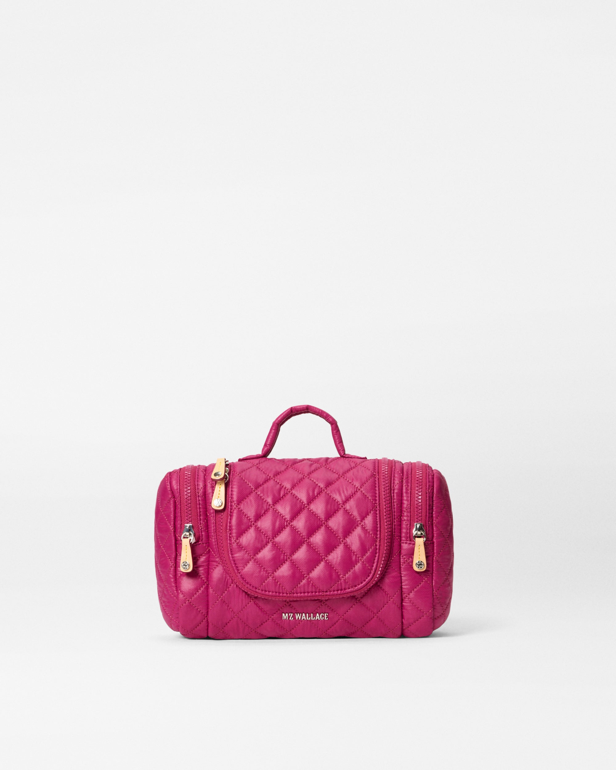 Front view of MZ Wallace Pink Travel Toiletry Bag