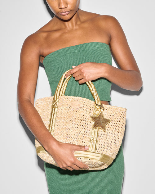 MZ Wallace Light Gold Sequin Star Bag Charm on crochet bag