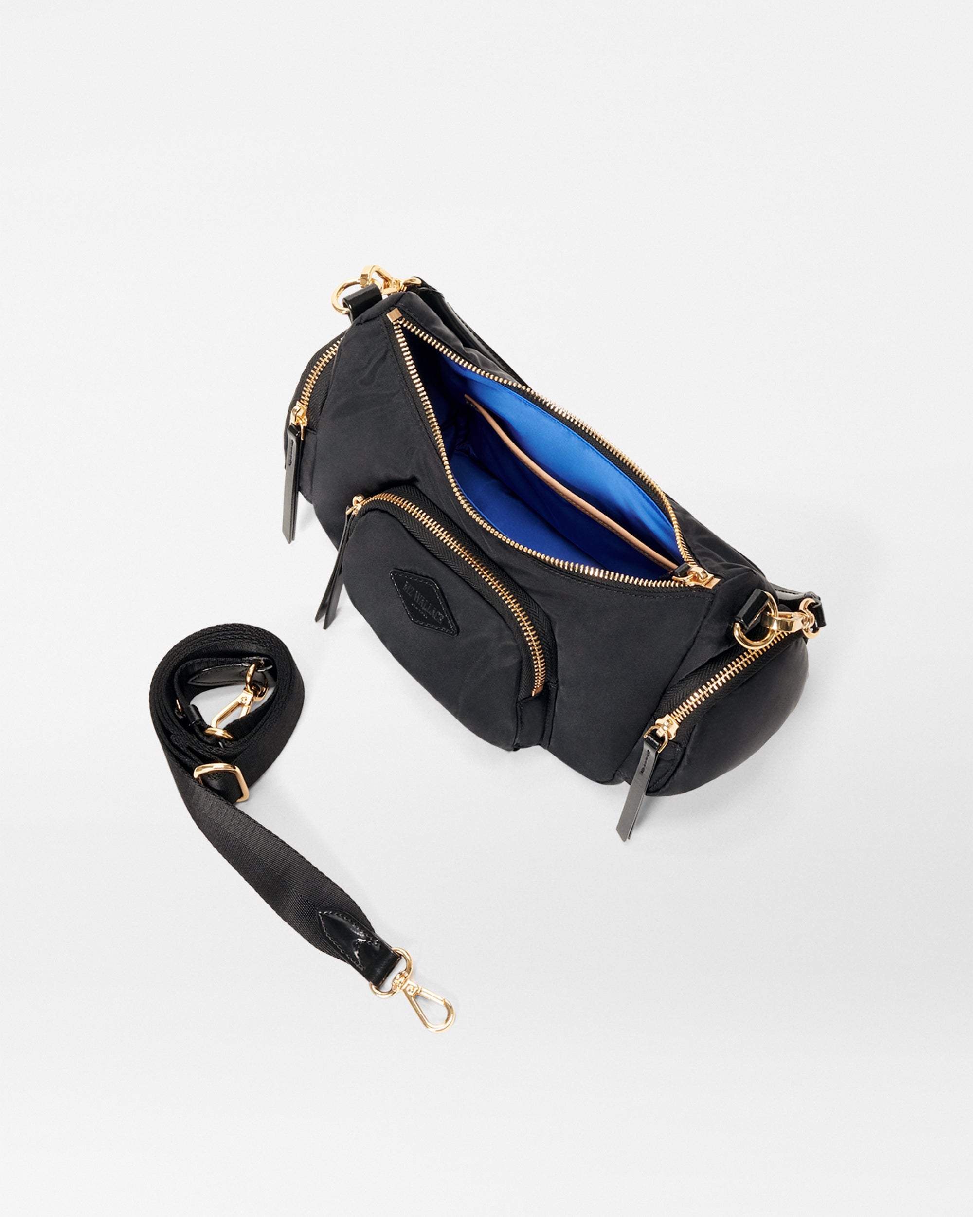 MZ Wallace Small Black Shoulder Bag opened with strap attachment next to it