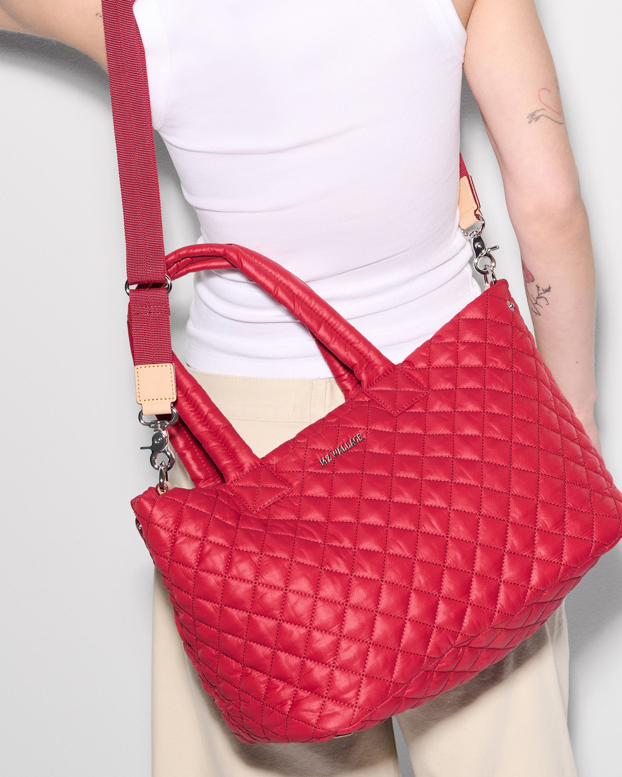 MZ Wallace Red Work Bag worn as crossbody 