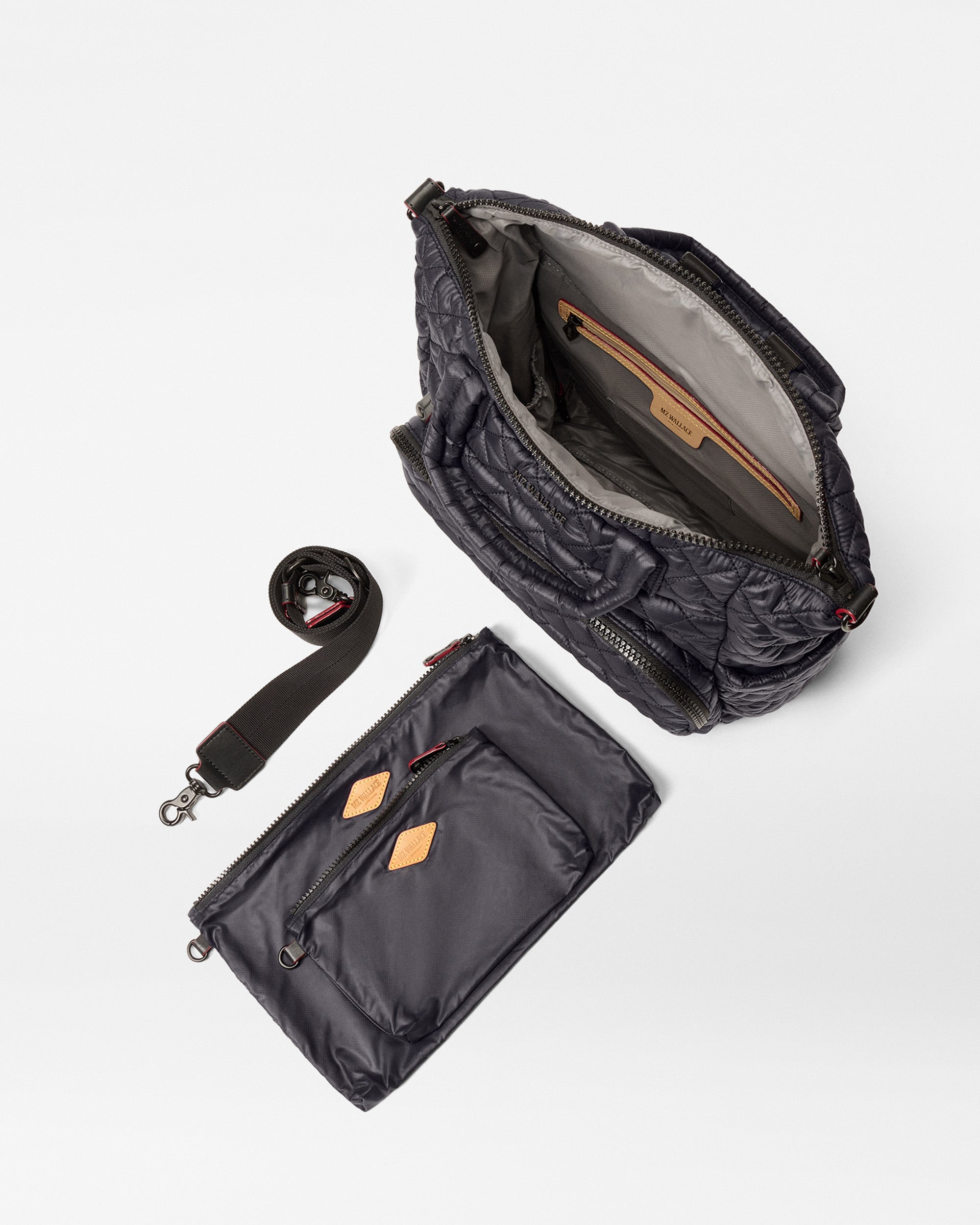 MZ Wallace Black Utility Backpack open with accessories