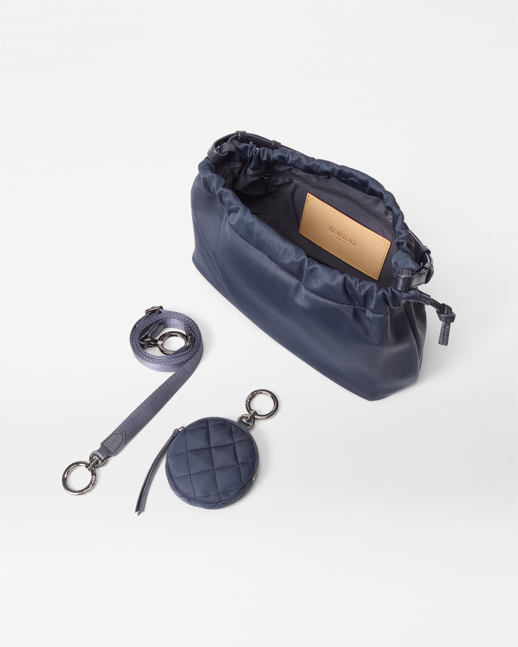 MZ Wallace Blue Shoulder Bag open with accessories
