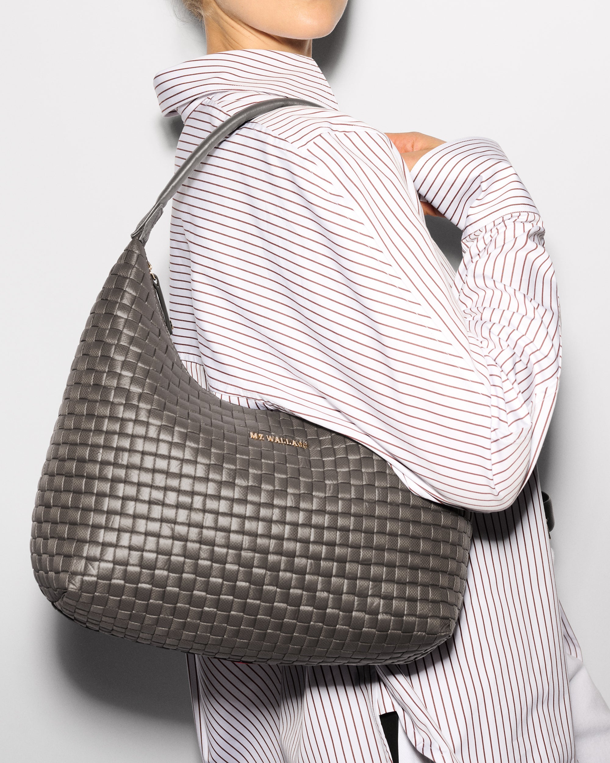 MZ Wallace Gray Woven Bag worn on shoulder