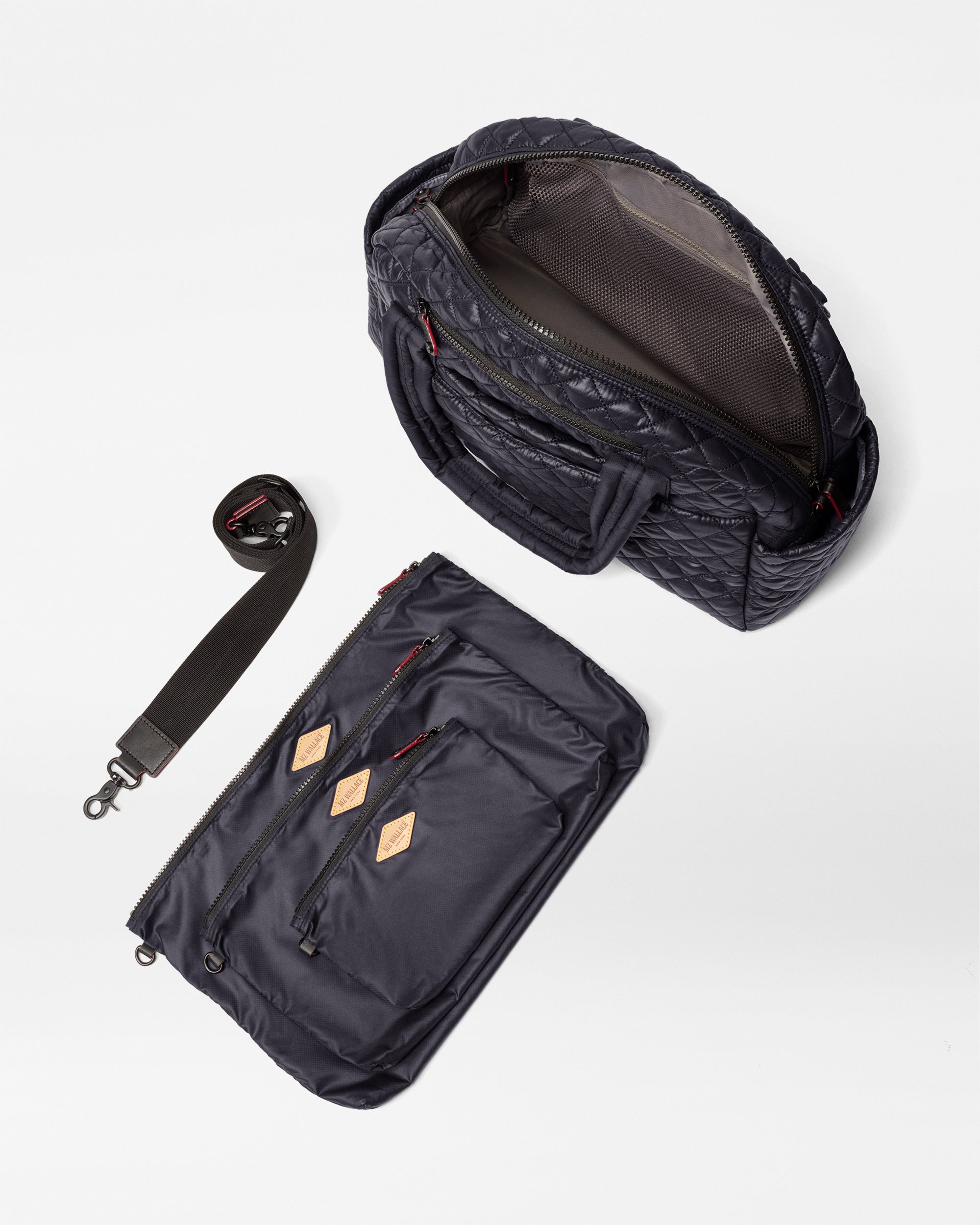 MZ Wallace Black Travel Duffle Bag open with accessories