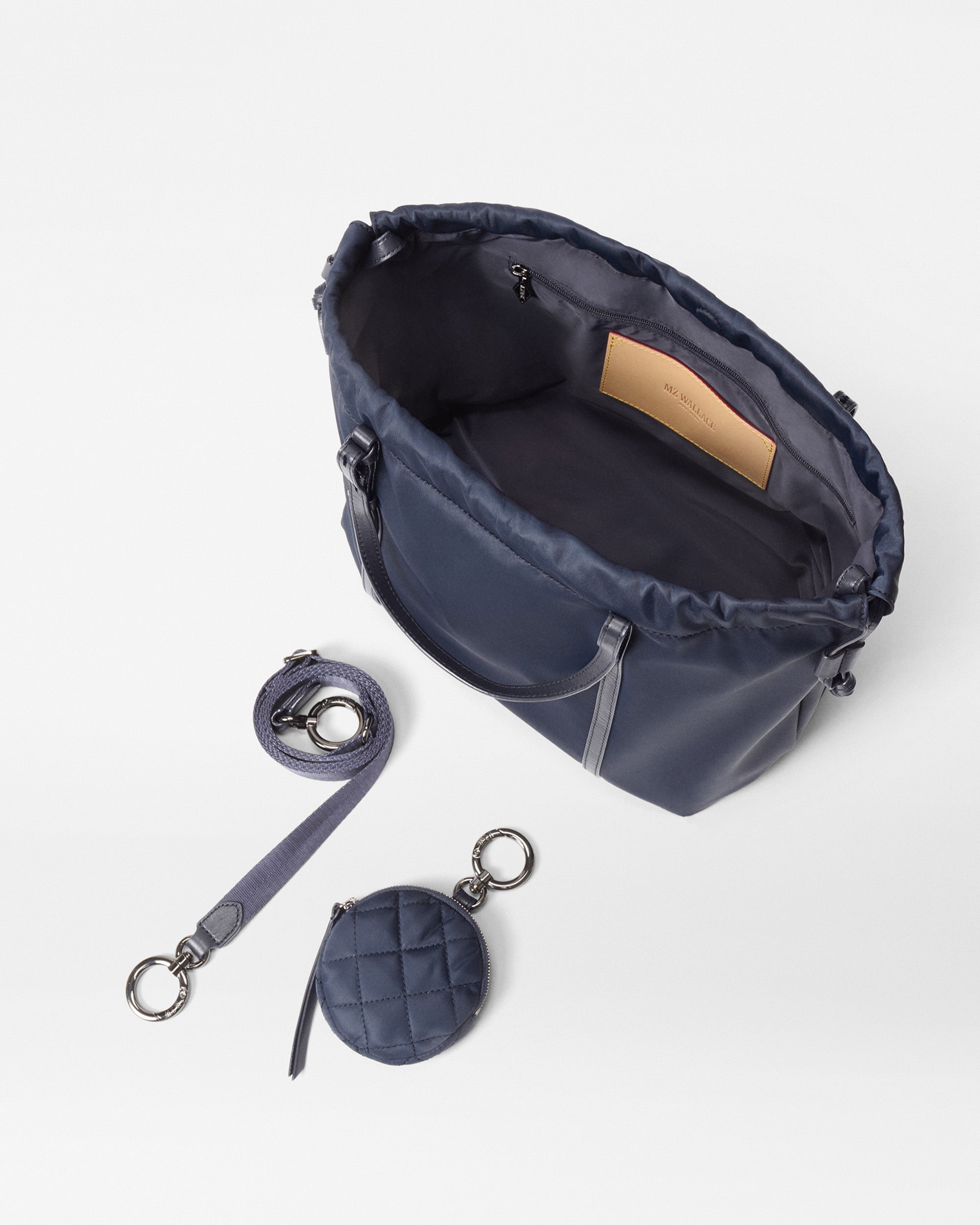 MZ Wallace Small Navy Tote Bag open with accessories