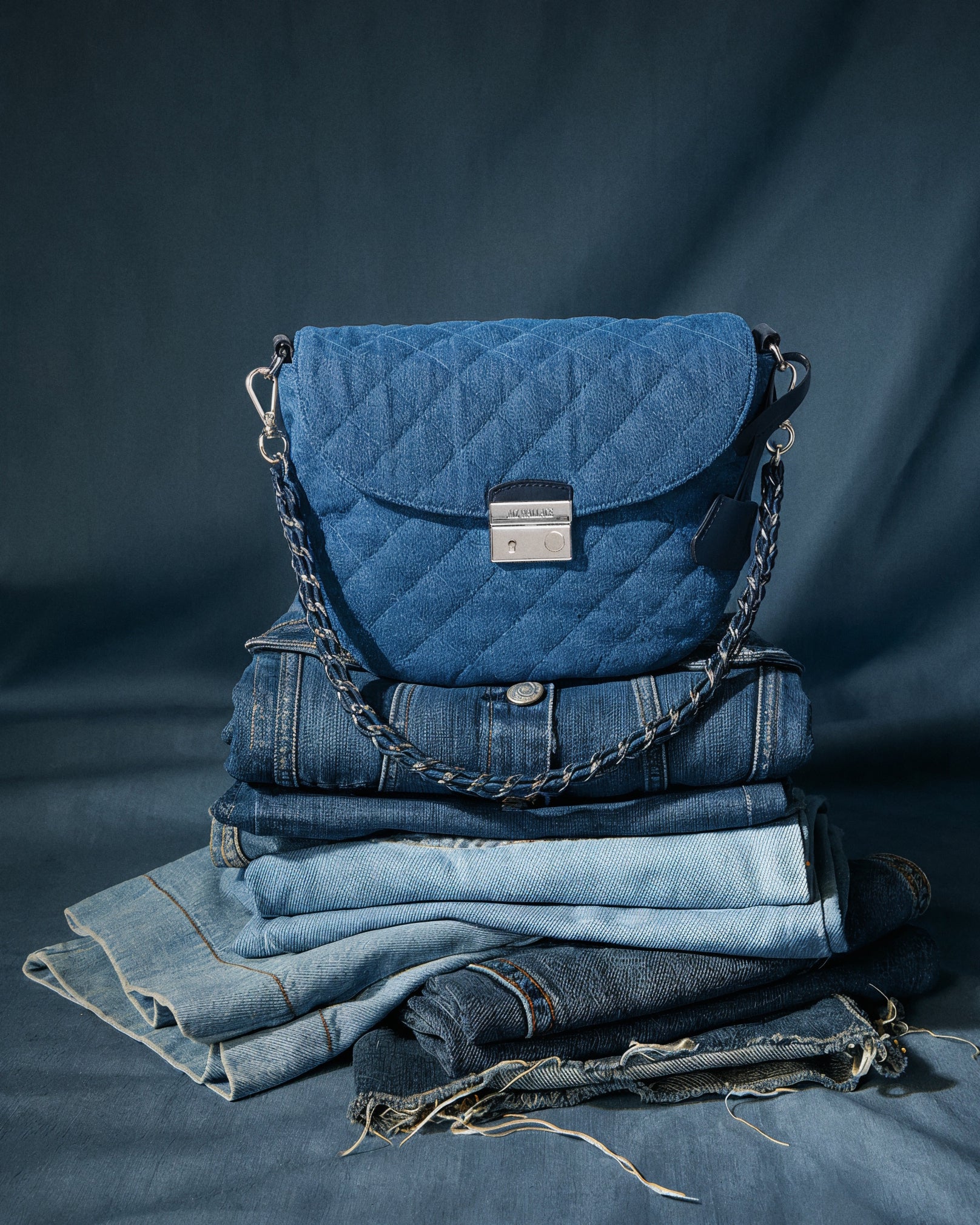 MZ Wallace | True Blue Denim Crosby Lock Saddle Handbag