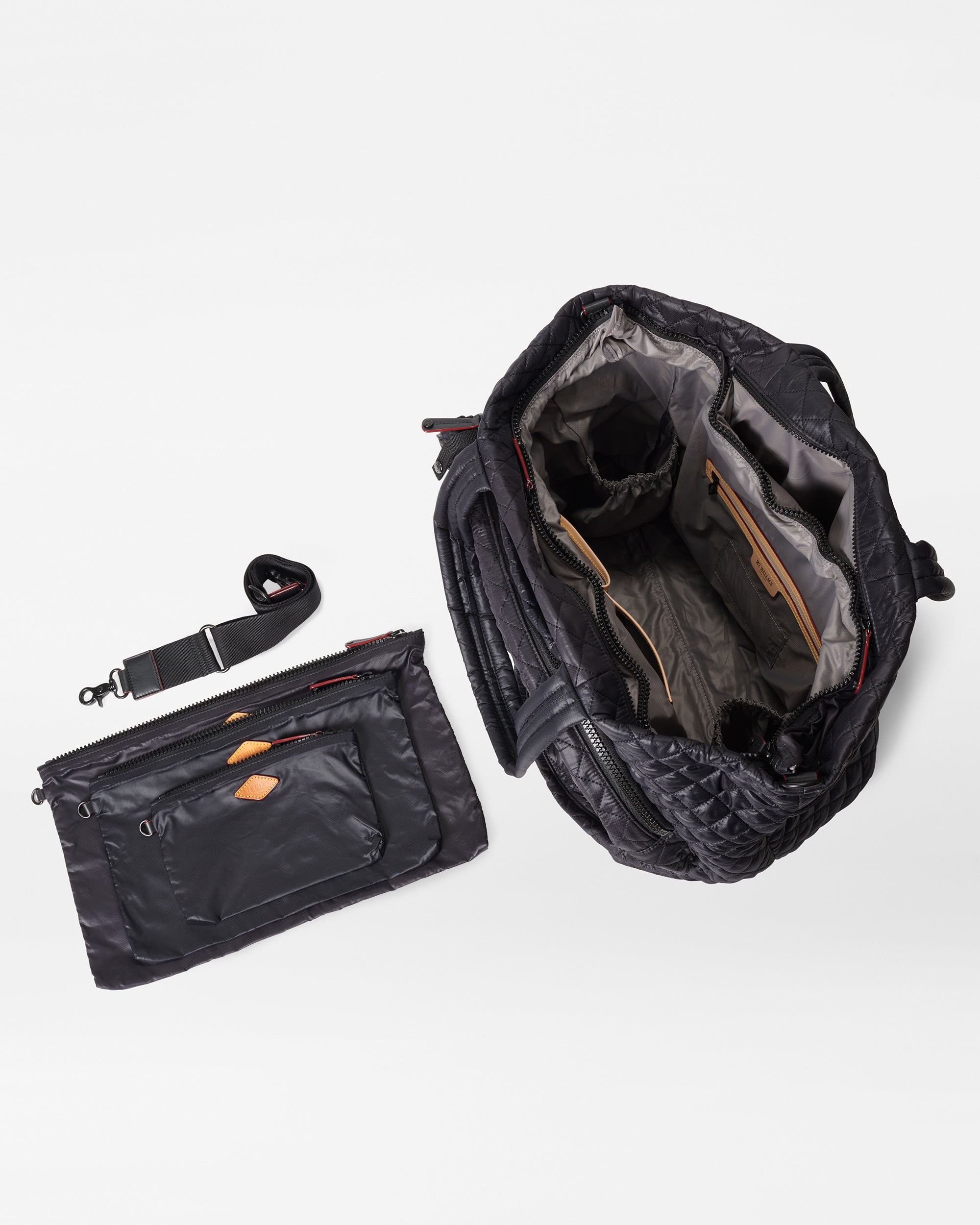 MZ Wallace Quilted Large Black Tennis Bag open with accessories
